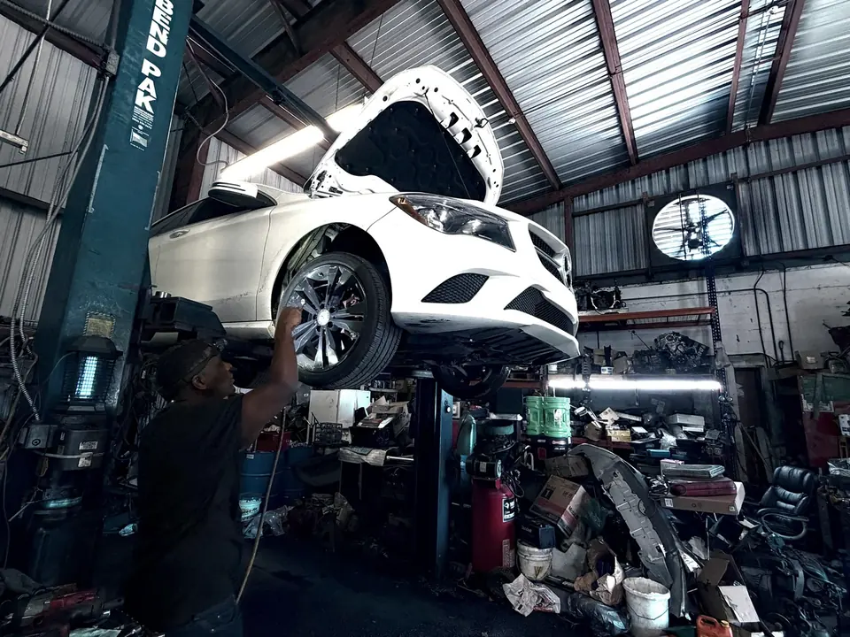 Wheel and suspension service on the lift at Front Line Auto